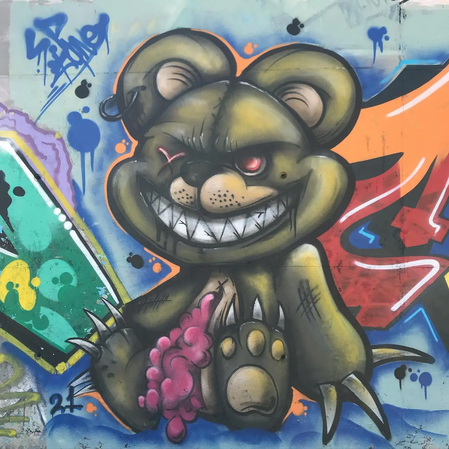graffiti de un oso malvado