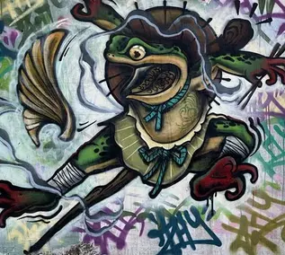 grafiti de una rana saltando
